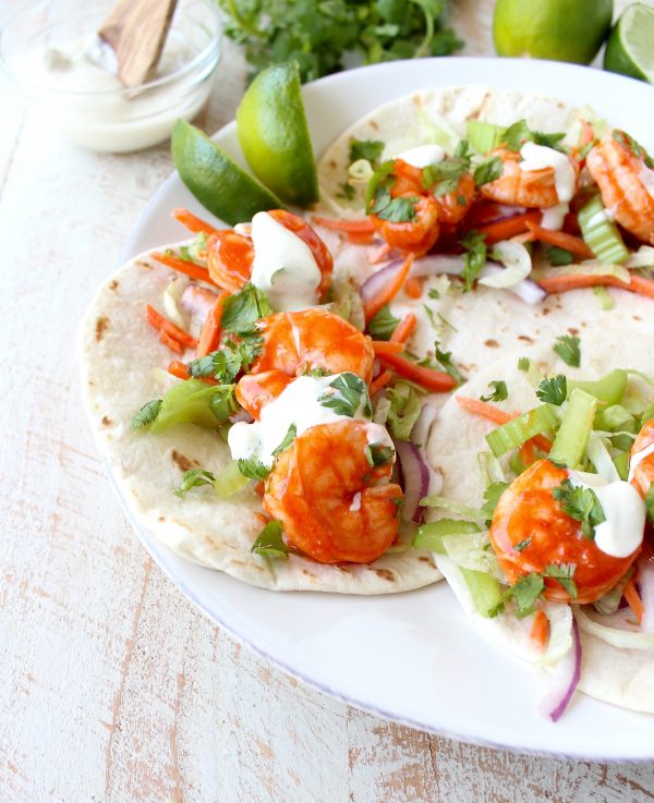 Buffalo Shrimp Tacos are an easy weeknight meal, made in just 15 minutes! They're also perfect for celebrating Taco Tuesday or Cinco De Mayo!