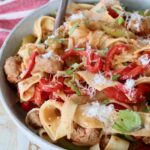 prepared Italian drunken noodles in bowl with fork