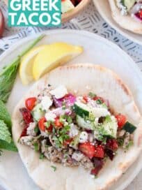 ground turkey meat and tomato salsa in pita bread on plate