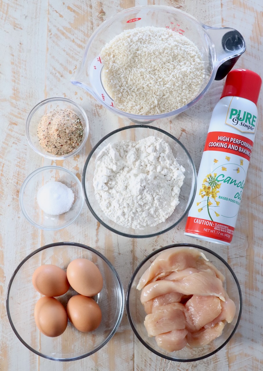 ingredients for air fryer chicken tenders on white wood board